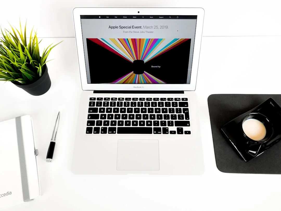 A well-organized design workspace with dual monitors and design software on display.